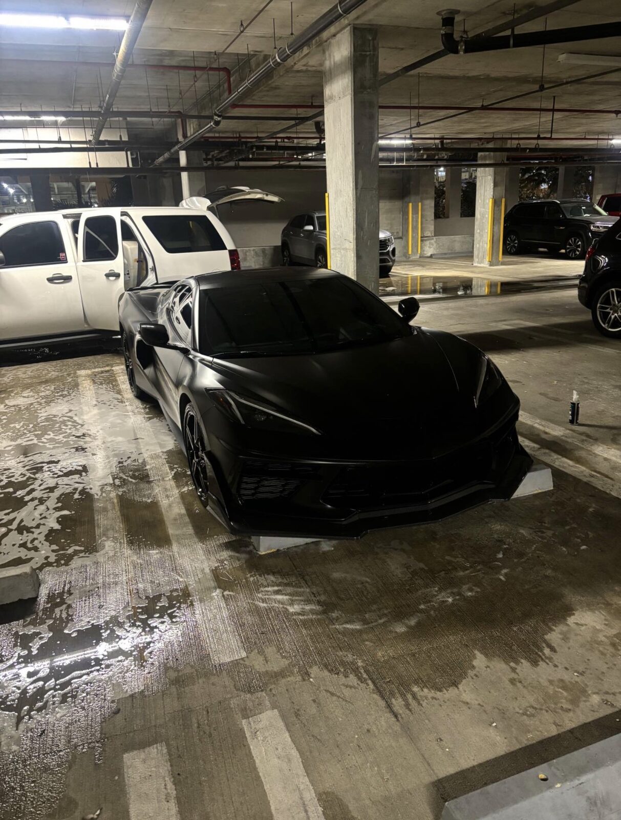 Chevrolet Corvette C8 black after full mobile detail and paint correction by The Detail Club LA — sports car detailing in the San Fernando Valley